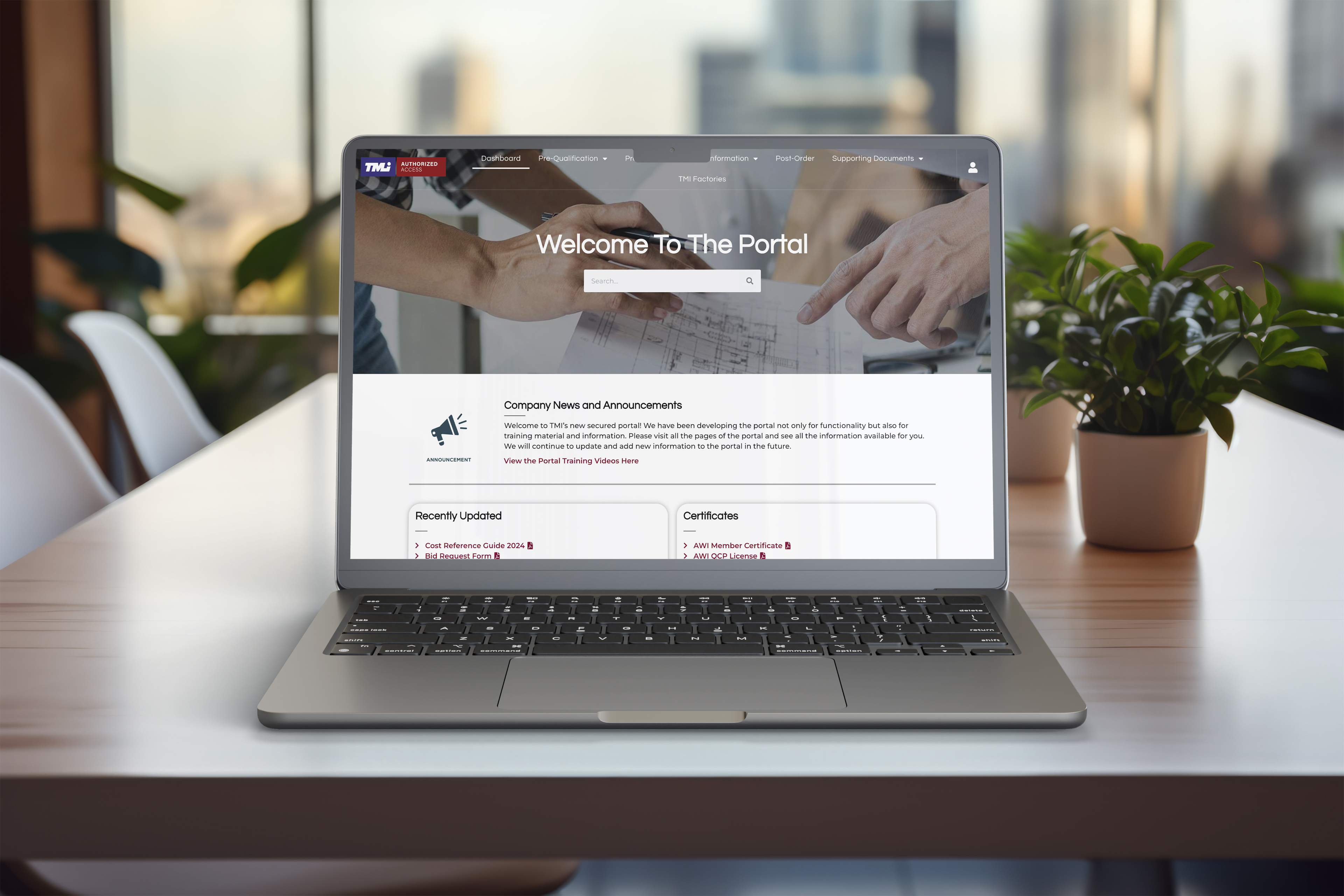 TMI dealer portal on a laptop